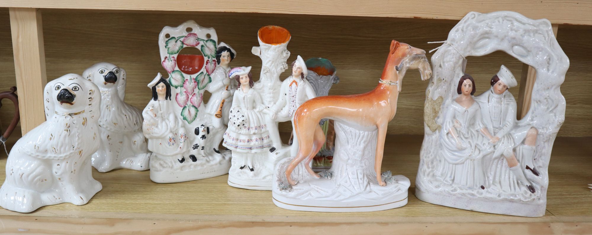 Seven Victorian Staffordshire flatbacks, tallest 33cm